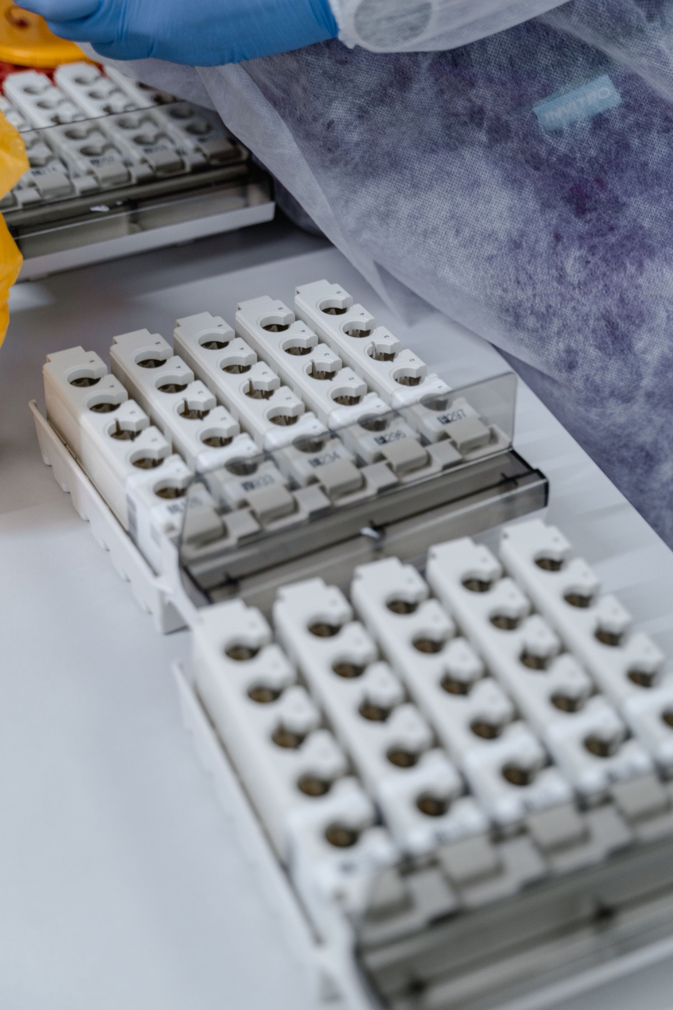 Racks of sample tubes inside an instrument